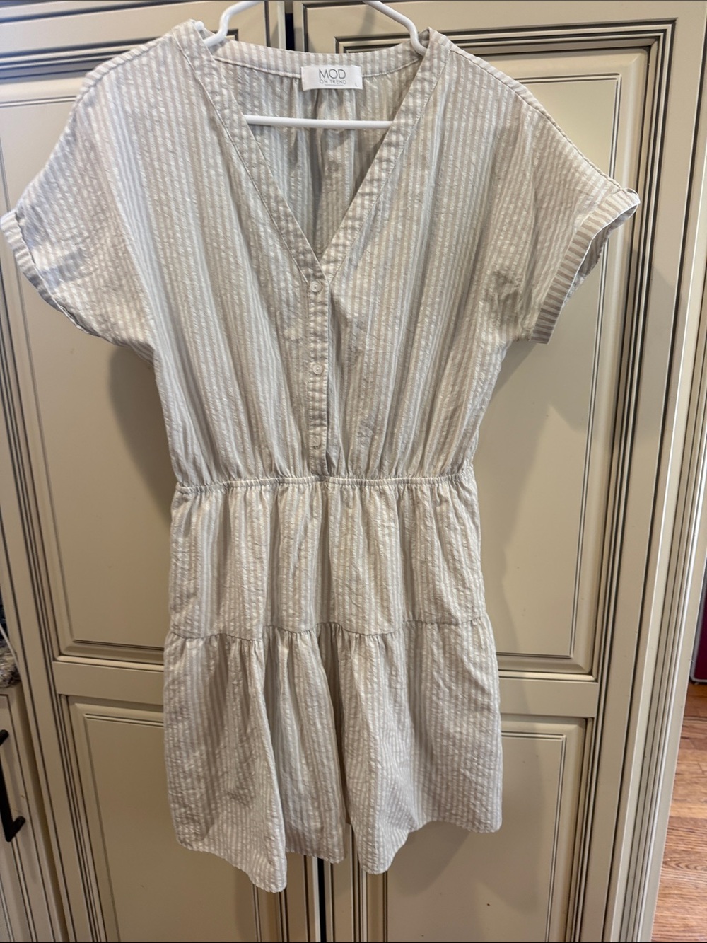 MOD on Trend woman’s Cream Striped Tiered Dress